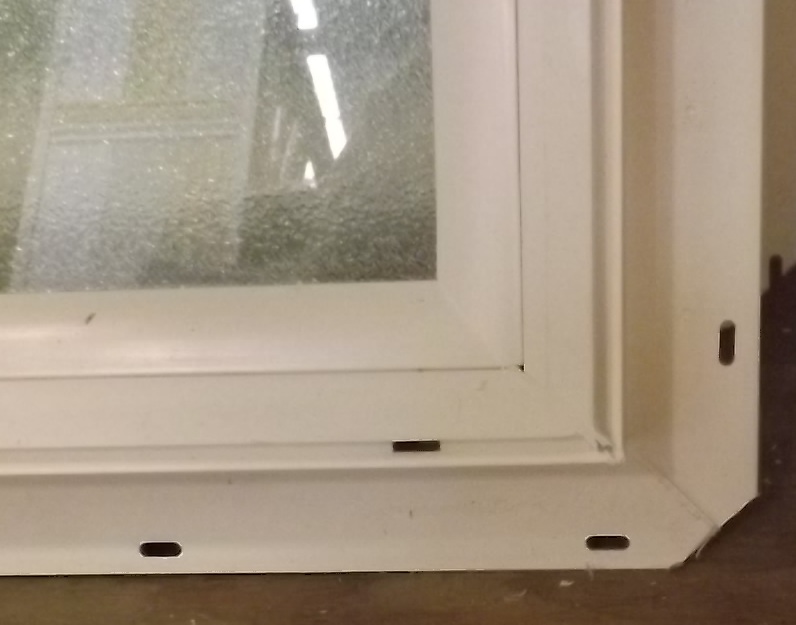 vinyl window with nail flange