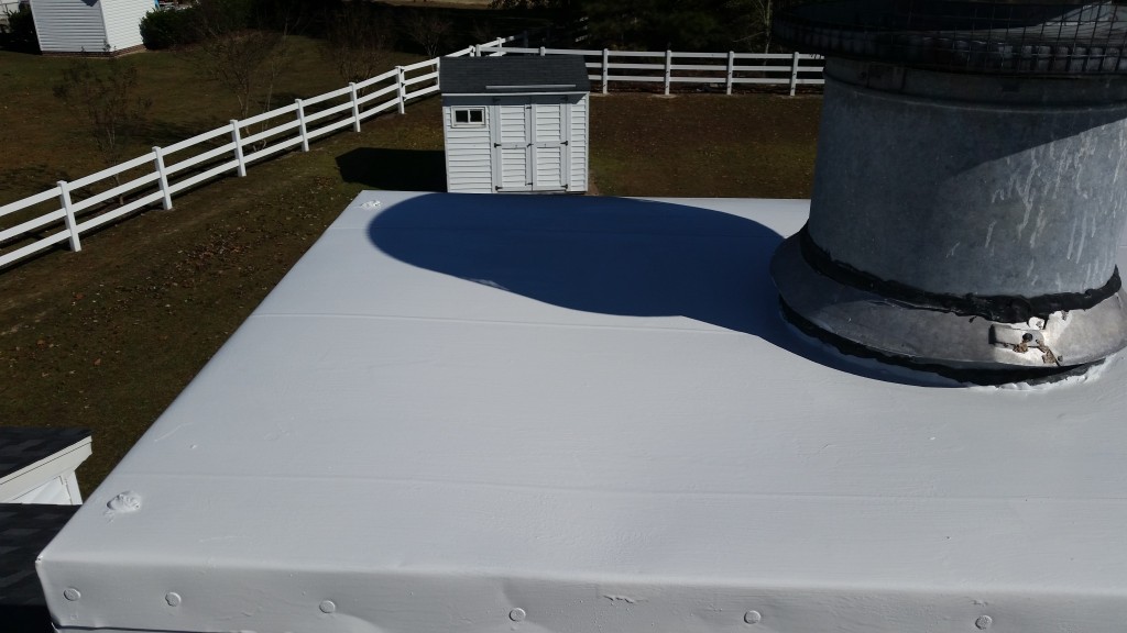 Properly sealed and painted chimney caps protect the chimney and look great